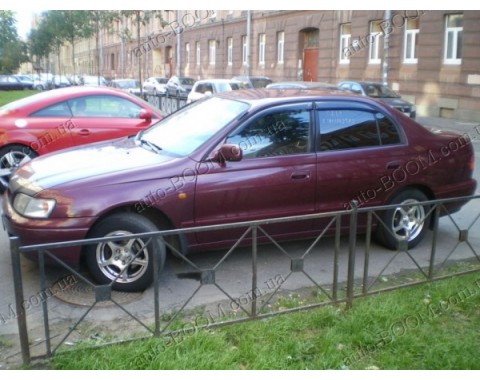 Дефлекторы окон на Toyota Carina 7 96-01 (Cobra Tuning)